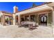 Covered patio with seating area, perfect for outdoor relaxation at 9840 N 111Th Pl, Scottsdale, AZ 85259
