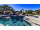 Luxury pool with fountains, spa, and a basketball hoop at 9840 N 111Th Pl, Scottsdale, AZ 85259