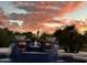 Evening view of the pool and fountain at sunset at 9840 N 111Th Pl, Scottsdale, AZ 85259