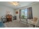Home office with hardwood floors and built-in shelving at 10412 W Audrey Dr, Sun City, AZ 85351