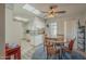 Kitchen and dining area with wooden table and chairs at 10412 W Audrey Dr, Sun City, AZ 85351