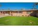 Ranch style home with well-maintained lawn at 10412 W Audrey Dr, Sun City, AZ 85351