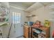 Storage room with shelving and additional storage space at 10412 W Audrey Dr, Sun City, AZ 85351