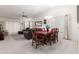 Elegant dining room with a wooden table and chandelier at 10714 E Nacoma Dr, Sun Lakes, AZ 85248