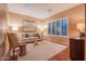 Cozy sitting area with hardwood floors and ample natural light at 10878 N 120Th Pl, Scottsdale, AZ 85259