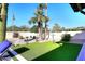 Landscaped backyard with artificial turf and cacti at 11142 E Sorrel Ln, Scottsdale, AZ 85259