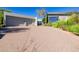 Two-car garage with attached contemporary home at 11209 E Dale Ln, Scottsdale, AZ 85262