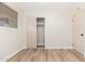 Bedroom with mirrored closet doors and neutral decor at 1136 N 84Th Pl, Scottsdale, AZ 85257