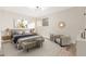 Spacious main bedroom with ample natural light and a comfortable sitting area at 1136 N 84Th Pl, Scottsdale, AZ 85257