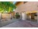 Private patio with access to interior, showing landscaping and brick flooring at 1136 N 84Th Pl, Scottsdale, AZ 85257