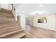 Light-toned wood staircase leads to the upper level of the home at 1136 N 84Th Pl, Scottsdale, AZ 85257