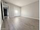Bright bedroom with hardwood floors and double door closet at 16041 N 31St St # 16, Phoenix, AZ 85032