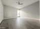 Spacious bedroom with hardwood floors and a large window at 16041 N 31St St # 16, Phoenix, AZ 85032