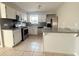 Updated kitchen with stainless steel appliances and granite countertops at 16041 N 31St St # 16, Phoenix, AZ 85032