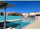 Community pool with ample deck space for sunbathing at 16041 N 31St St # 16, Phoenix, AZ 85032