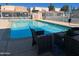 Inviting community pool with patio furniture for relaxation at 16041 N 31St St # 16, Phoenix, AZ 85032