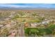 Wide aerial view of neighborhood with golf course and mountain backdrop at 16804 E Monterey Dr, Fountain Hills, AZ 85268