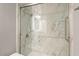 Clean bathroom with marble shower and built-in shelving at 16804 E Monterey Dr, Fountain Hills, AZ 85268