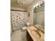 Bright bathroom with single vanity and shower/tub combo at 1831 E Kirkland Ln # B, Tempe, AZ 85281