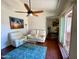 Bright living room with hardwood floors, comfy seating, and a ceiling fan at 1831 E Kirkland Ln # B, Tempe, AZ 85281