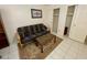 Small office space with a futon, desk and bookshelf at 1831 E Kirkland Ln # B, Tempe, AZ 85281