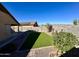 Artificial turf, landscaped yard with mountain views at 19622 W Morning Glory St, Buckeye, AZ 85326