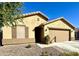 Newly built home with a two-car garage and well-maintained landscaping at 19622 W Morning Glory St, Buckeye, AZ 85326