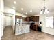 Spacious kitchen with stainless steel appliances and an island at 19622 W Morning Glory St, Buckeye, AZ 85326