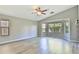 Bright living room featuring hardwood floors and large windows at 2332 W Roy Rogers Rd, Phoenix, AZ 85085