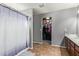 Bathroom with double vanity and shower/tub combo at 23559 W Wayland Dr, Buckeye, AZ 85326