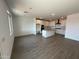 Open concept kitchen with island and stainless steel appliances at 27018 N 168Th Ln, Surprise, AZ 85387