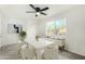 Elegant dining room with a white table and six fluffy chairs at 2726 W Lawrence Rd, Phoenix, AZ 85017