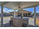 Covered patio with granite bar and ceiling fan at 2905 S 121St Dr, Tolleson, AZ 85353