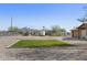 House exterior showcasing a gravel yard and artificial turf at 3165 W Foothill St, Apache Junction, AZ 85120