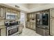 Kitchen with stainless steel appliances and granite countertops at 3223 E Cedarwood Ln, Phoenix, AZ 85048