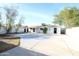 Large backyard with concrete slab and mature trees at 3615 W San Juan Ave, Phoenix, AZ 85019