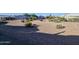 Spacious backyard with gravel and desert landscaping at 650 N Hawes Rd # 4101, Mesa, AZ 85207