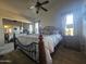 Spacious bedroom with king-size bed and mirrored closet at 650 N Hawes Rd # 4101, Mesa, AZ 85207