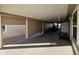 Covered carport with storage and roll-up shutters at 650 N Hawes Rd # 4101, Mesa, AZ 85207