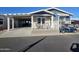 Front view of the house with carport and patio at 650 N Hawes Rd # 4101, Mesa, AZ 85207