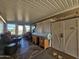 Bright sunroom with wicker furniture and tiled floor at 650 N Hawes Rd # 4101, Mesa, AZ 85207