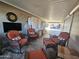 Sunroom with wicker furniture and access to patio at 650 N Hawes Rd # 4101, Mesa, AZ 85207