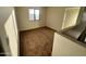 Spacious bedroom with neutral carpet and ample natural light at 7035 W Rose Ln, Glendale, AZ 85303