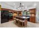 Gourmet kitchen boasting granite island and stainless steel appliances at 8618 E Santa Catalina Dr, Scottsdale, AZ 85255