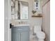 Modern bathroom with gray vanity and shower at 10191 E Diamond Rim Dr # 2122, Scottsdale, AZ 85255