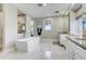 Spa-like bathroom with soaking tub and double vanity at 10191 E Diamond Rim Dr # 2122, Scottsdale, AZ 85255