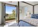 Bedroom with private balcony and mountain views at 10191 E Diamond Rim Dr # 2122, Scottsdale, AZ 85255
