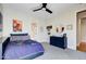 Superhero themed bedroom with a navy dresser and full-size bed at 10191 E Diamond Rim Dr # 2122, Scottsdale, AZ 85255
