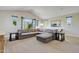 Bright bonus room with sectional sofa and access to balcony at 10191 E Diamond Rim Dr # 2122, Scottsdale, AZ 85255