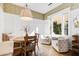 Charming breakfast nook with built-in banquette and wood table at 10191 E Diamond Rim Dr # 2122, Scottsdale, AZ 85255